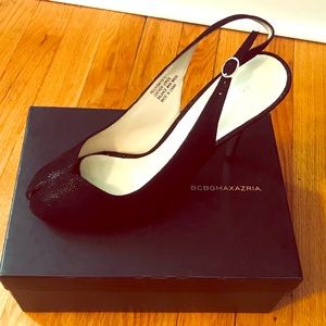 BCBG Sling back peep toe with silver heel.